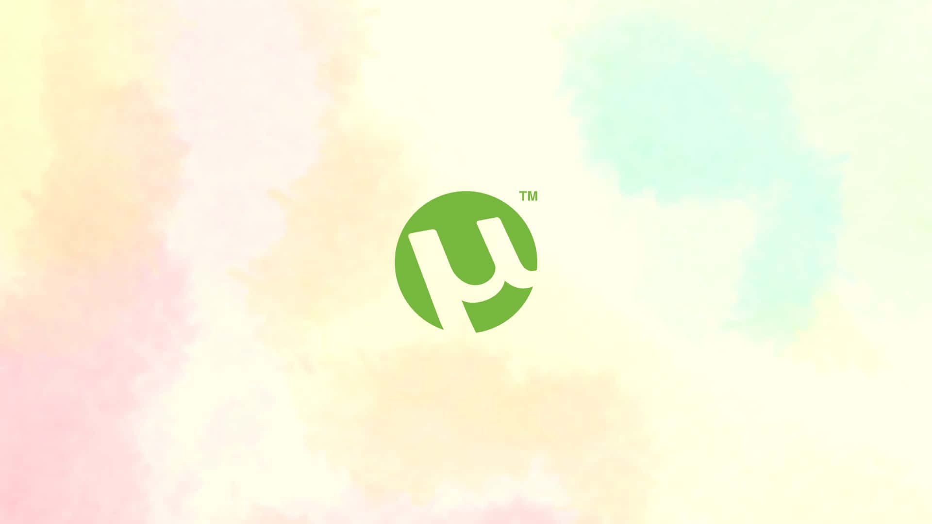 Watercolor 桌布 壁紙 — 一個綠色圓形標誌，帶有風格化的「u」，位於柔和粉彩水彩背景中央，融合了蜜桃粉紅和薄荷綠。