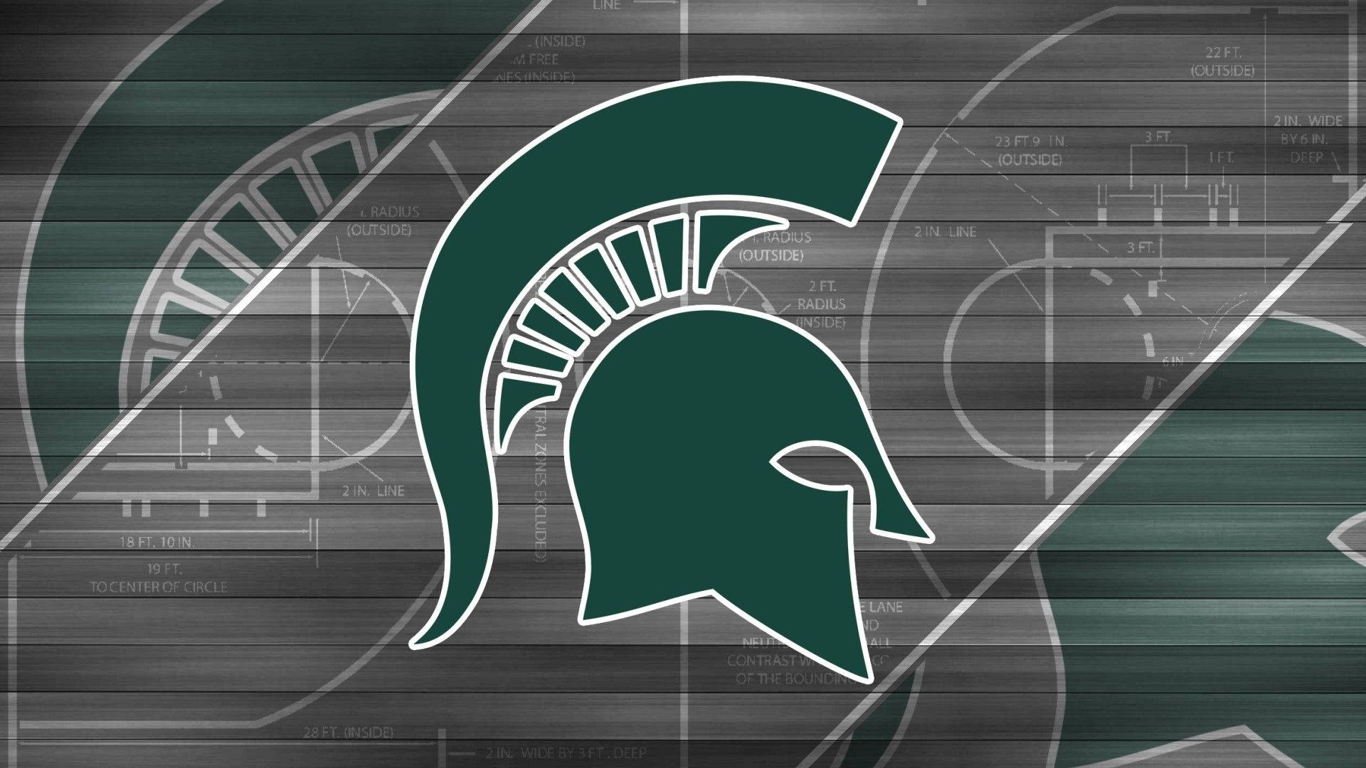 Michigan State Spartans 桌布 壁紙 — 一個綠色斯巴達頭盔標誌居中於灰色木質背景上，疊加褪色的籃球場藍圖。