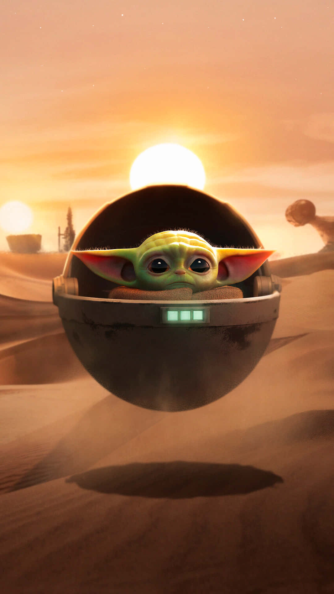 Baby Yoda iPhone 桌布 壁紙 — 一個綠色皮膚、大耳朵的嬰兒從漂浮的球形莢艙中探出頭來，俯瞰著日落時分的沙漠。