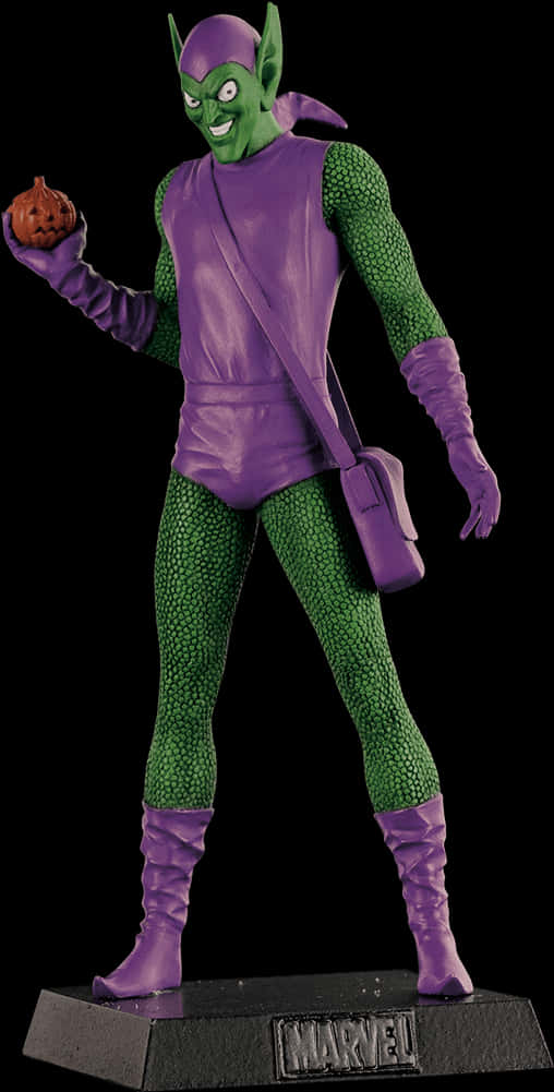 Villain 桌布 壁紙 — 一個綠色皮膚的Marvel反派穿著紫色和綠色的服裝，在黑色背景前拿著一個雕刻的南瓜。