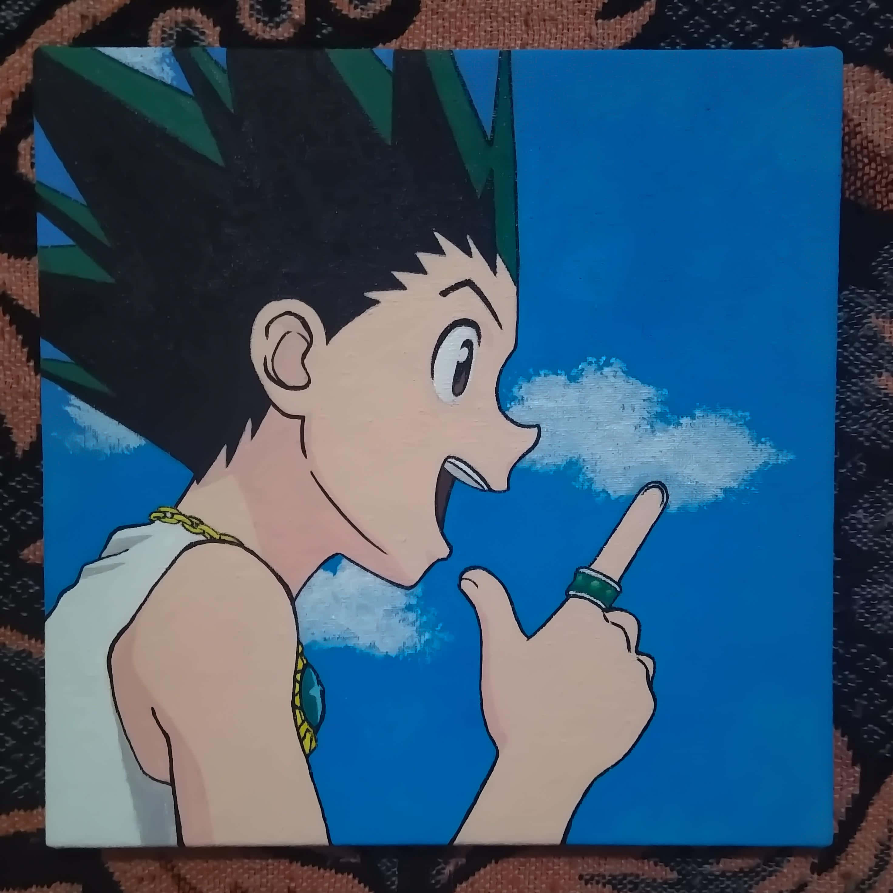 桌布 壁紙 — 一個繪畫的動漫角色，有著尖刺黑色頭髮和綠色高光，穿著白色背心和綠色戒指，指著一朵雲。