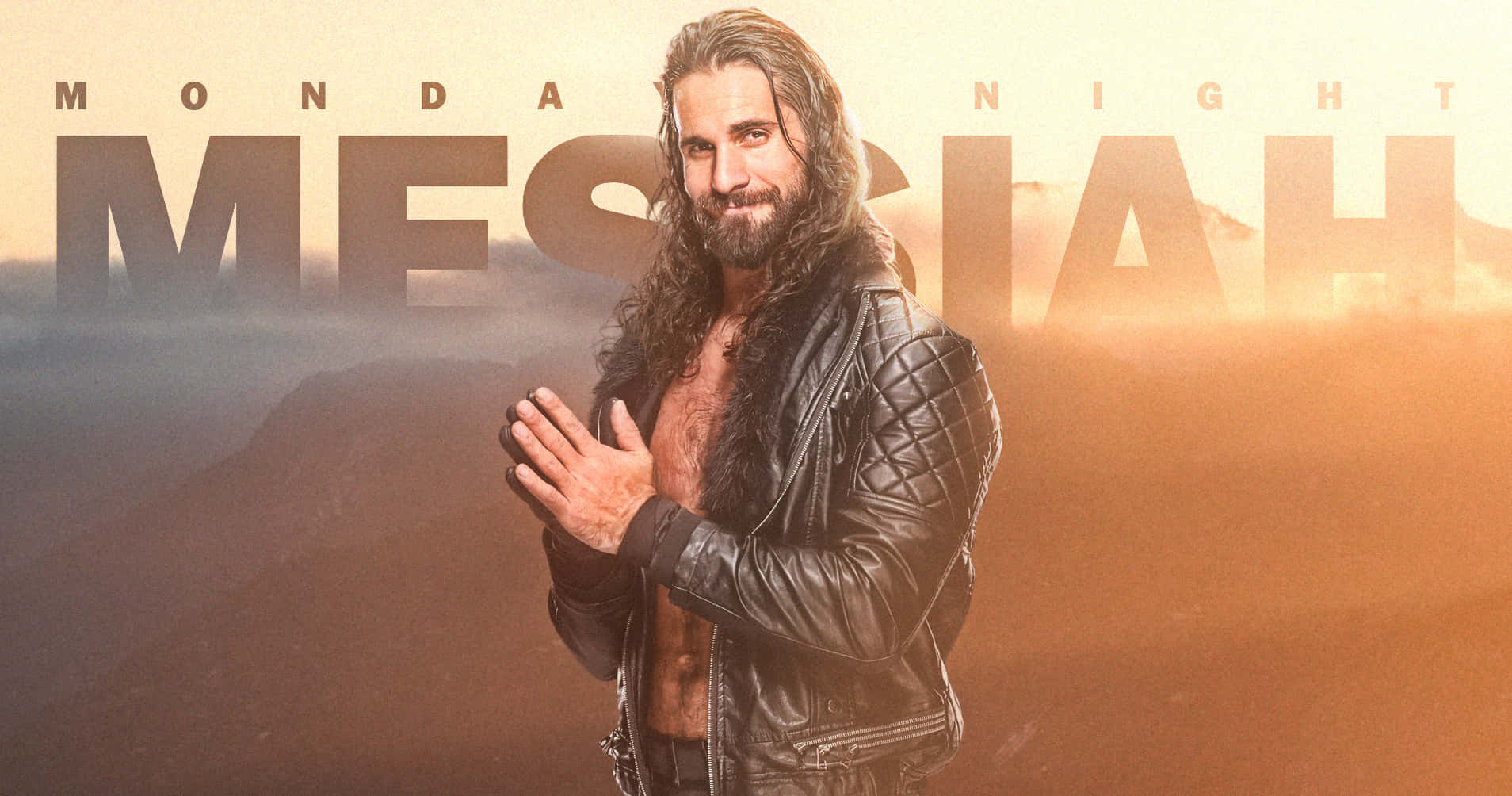 WWE 桌布 壁紙 — 一個肌肉發達、長髮鬍鬚的男人穿著黑色皮夾克，自信地站在朦朧的山景背景下，帶有「MONDAY NIGHT MESIAH」文字。