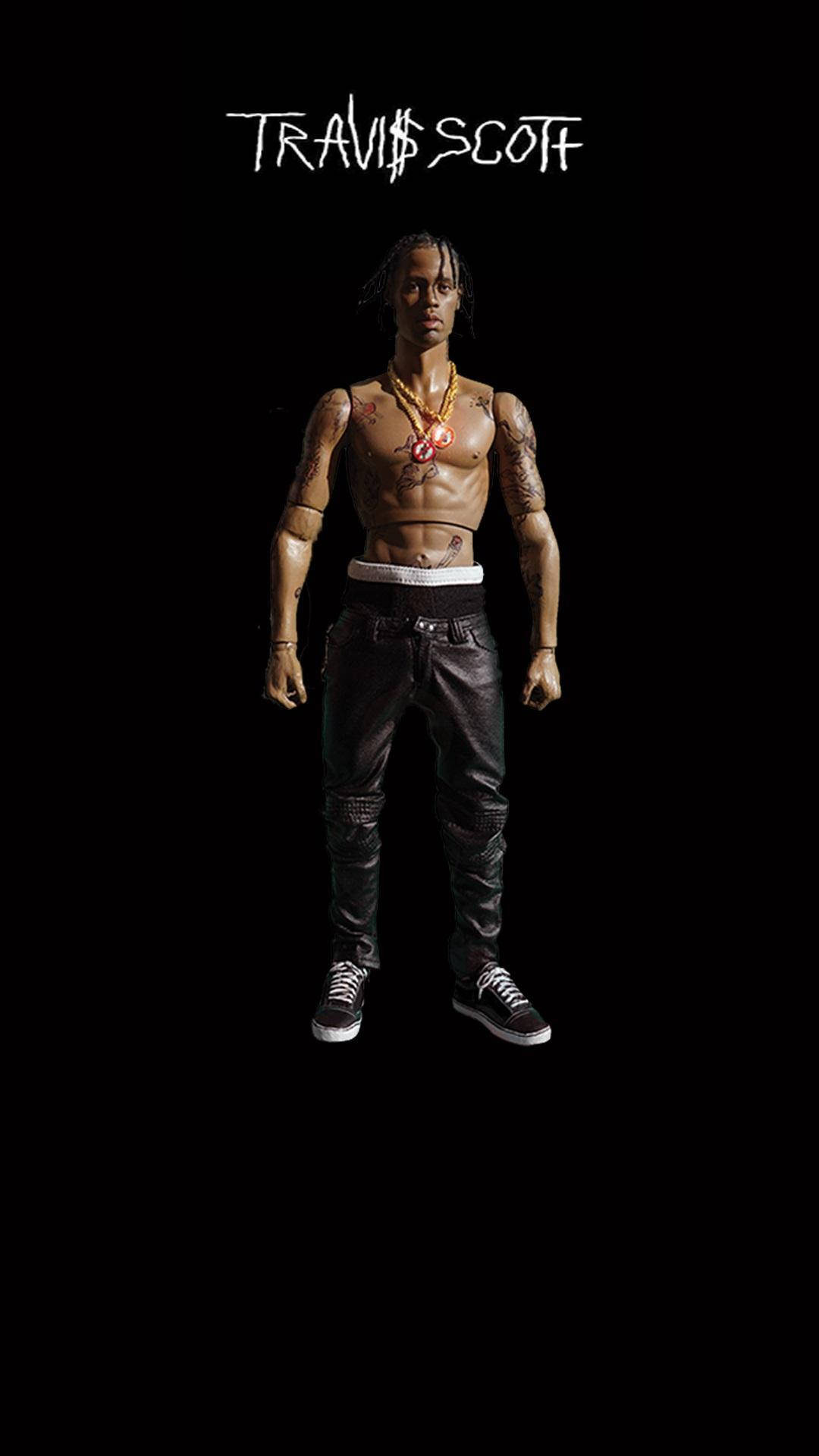 說唱歌手 桌布 壁紙 — 一個肌肉發達的 Travis Scott 人偶站在黑色背景前，穿著皮褲和運動鞋，帶有刺青和金鏈。