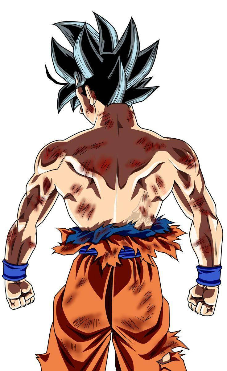 Ultra Instinct Goku 桌布 壁紙 — 一個肌肉發達的動漫戰士的背影，擁有尖刺的藍黑色頭髮和背上的戰鬥傷疤，穿著橙色褲子和藍色腕帶。