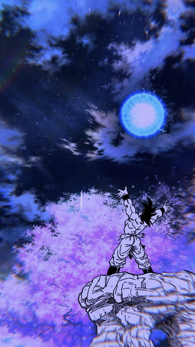 spirit 桌布 壁紙 — 一個肌肉發達的動漫戰士站在岩石懸崖上，伸手觸摸一顆發光的藍色能量球，背景是繁星點點的紫色夜空。
