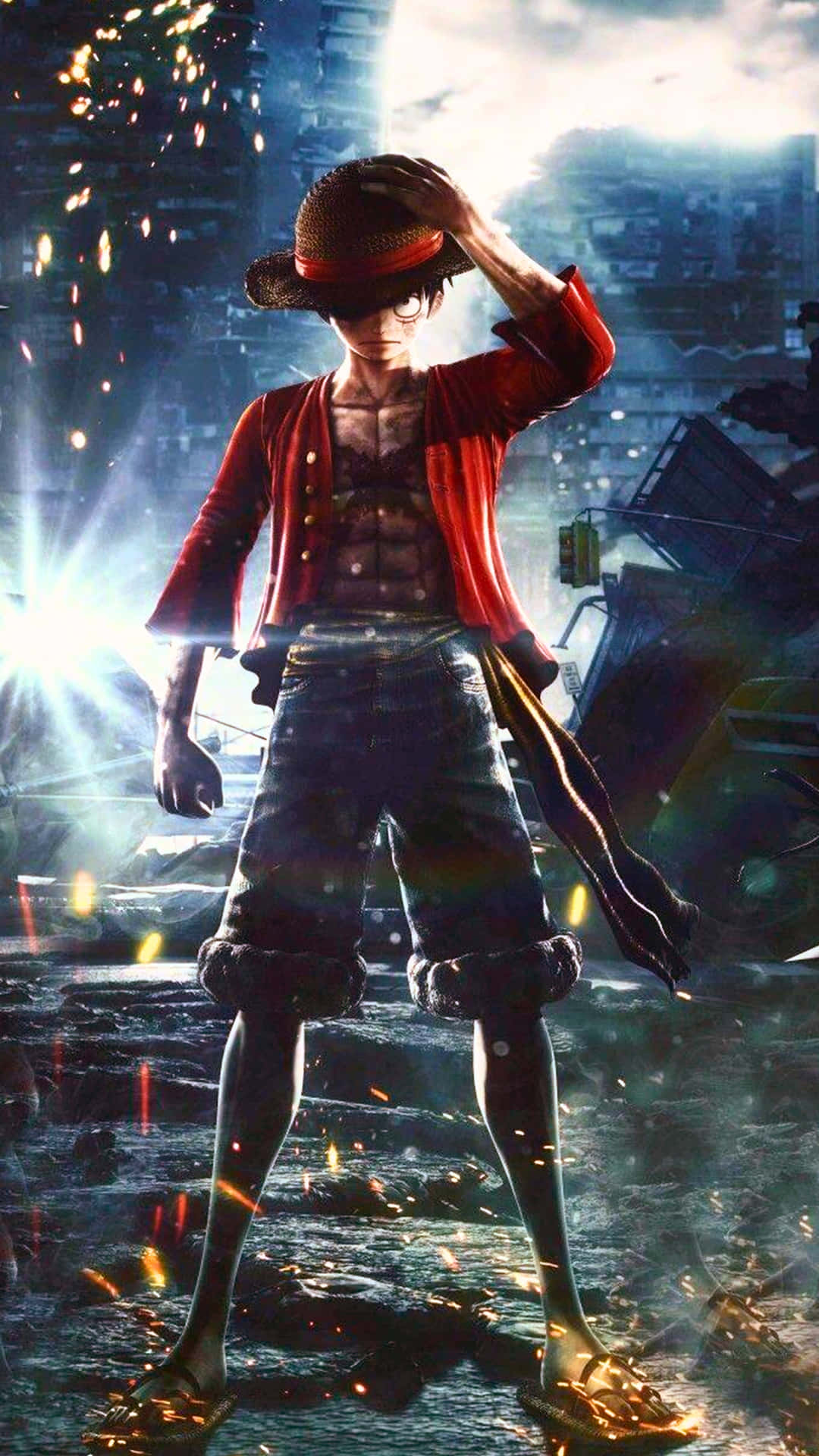 luffy standing 壁紙 — 一個肌肉發達的動漫男孩，身穿紅色外套和草帽，在火花四濺的廢墟城市中挑釁地站立。