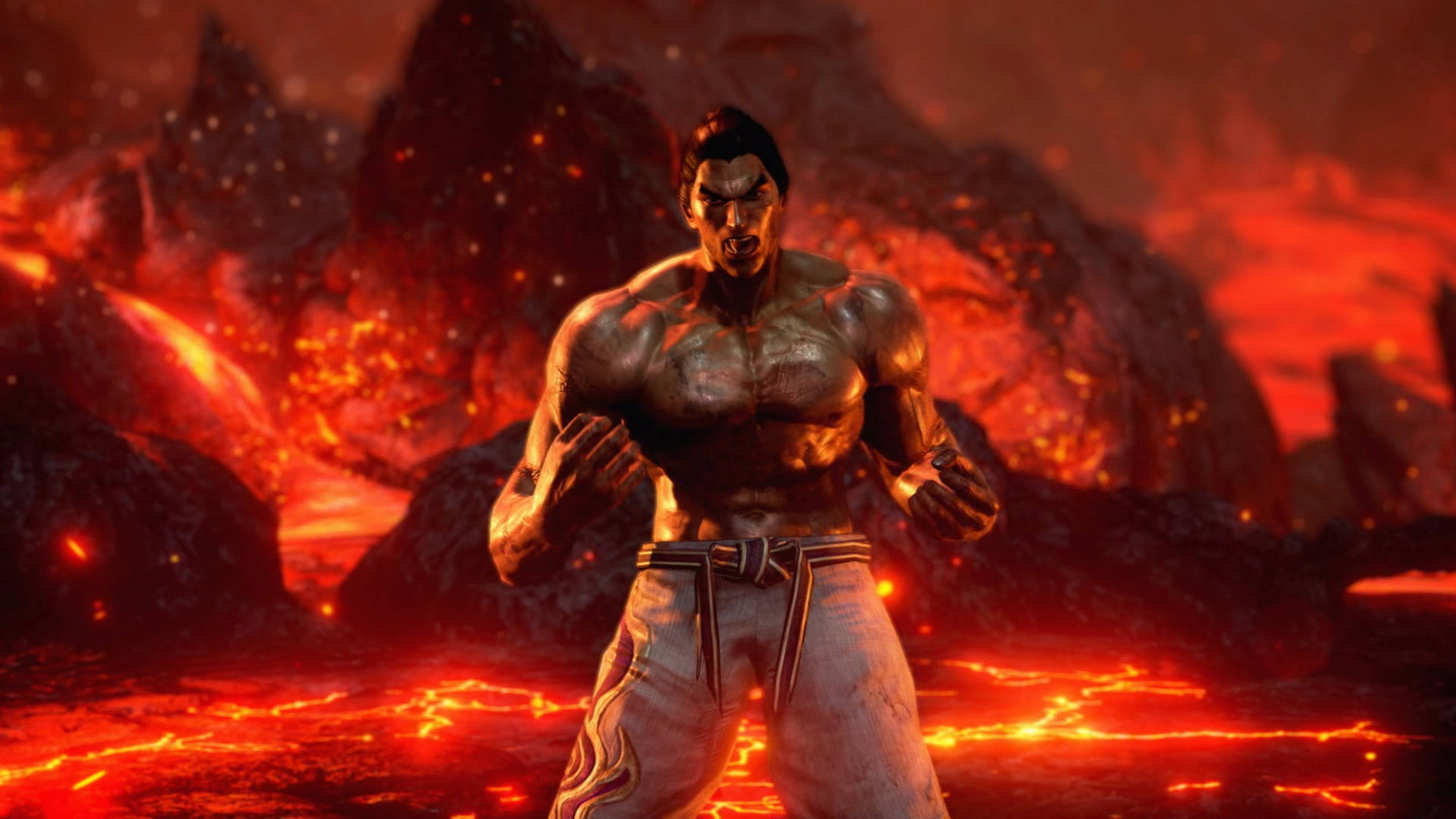 kazuya mishima 桌布 壁紙 — 一個肌肉發達的戰士在熾熱的火山景觀中挑釁地站立，周圍是發光的熔岩河流和熔岩岩石形成。
