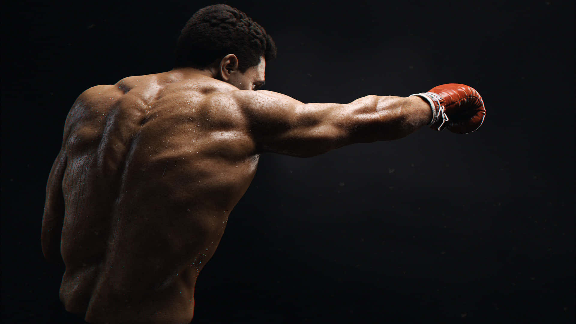 Boxing 桌布 壁紙 — 一個肌肉發達的拳擊手戴著紅色手套，在黑暗背景下打出強力一拳，汗水在他背上閃閃發光。