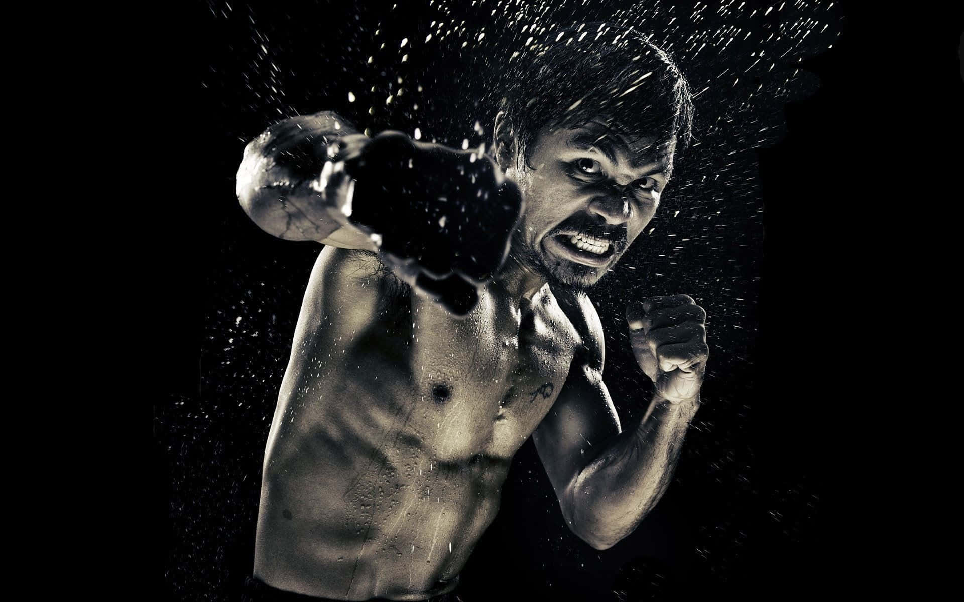 Boxing 桌布 壁紙 — 一個肌肉發達的拳擊手打出強力一拳，水花在黑色背景上戲劇性地飛濺。