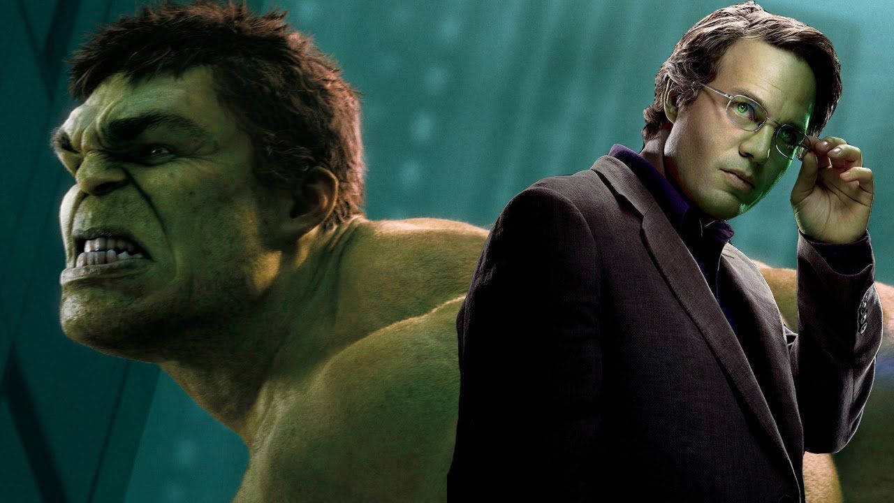 Mark Ruffalo 桌布 壁紙 — 一個肌肉發達的綠色浩克在一個戴眼鏡、身穿深色西裝、正在調整眼鏡的男人旁邊咆哮，背景是青綠色。