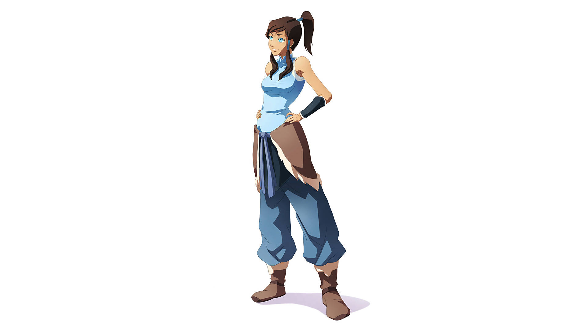 Korra 桌布 壁紙 — 一個自信的動漫女孩，棕色頭髮紮成馬尾辮，以動態姿勢站立，穿著藍色上衣和帶棕色裝飾的褲子。