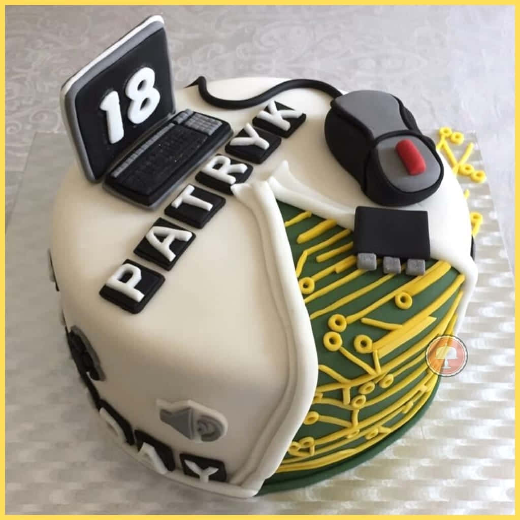 Cake Fondant 桌布 壁紙 — 一個自訂的生日蛋糕，形狀像電腦，配有翻糖筆記型電腦滑鼠和電路板設計。