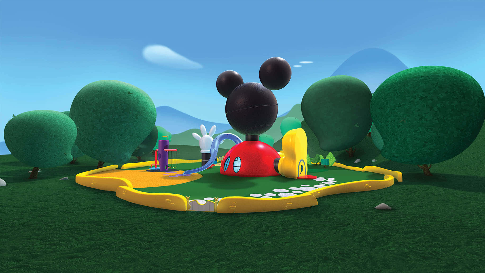 Mickey Mouse Home 桌布 壁紙 — 一個色彩繽紛的3D渲染米奇老鼠形狀遊樂場，設有彩色溜滑梯和綠色灌木叢，在晴朗的藍天下。