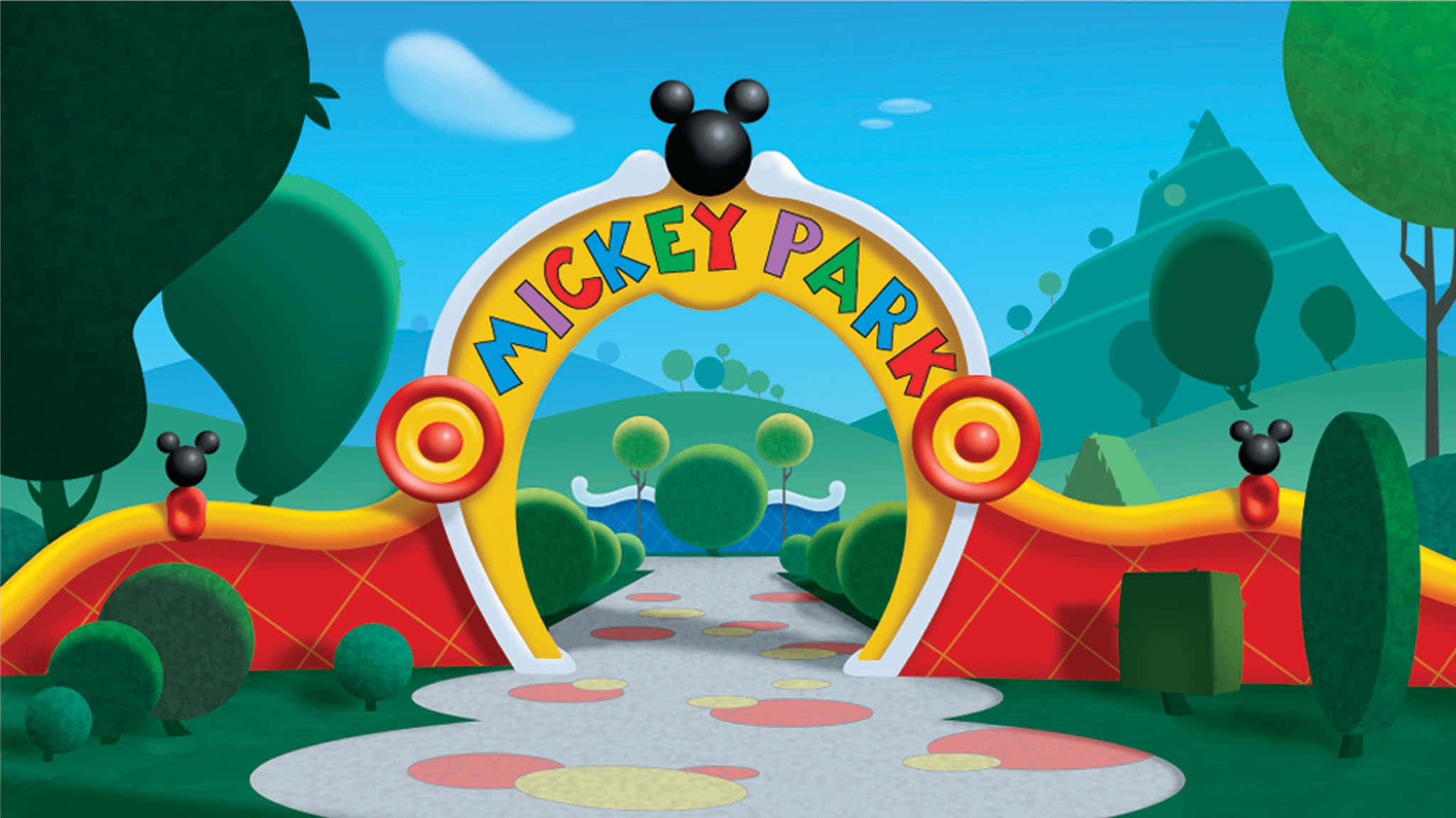 Mickey Mouse Clubhouse 桌布 壁紙 — 一個色彩繽紛的卡通拱門，上面寫著 Mickey Park，並有米奇老鼠耳朵和圓點圖案，通往明亮藍天下一個奇妙的綠色景觀。