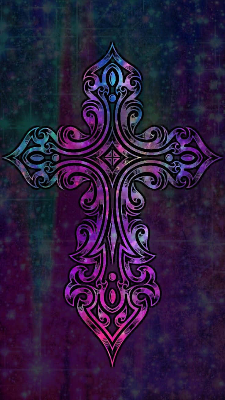 Pink Cross 桌布 壁紙 — 一個華麗的紫色和藍綠色十字架，帶有漩渦圖案，在紋理宇宙背景上發光。