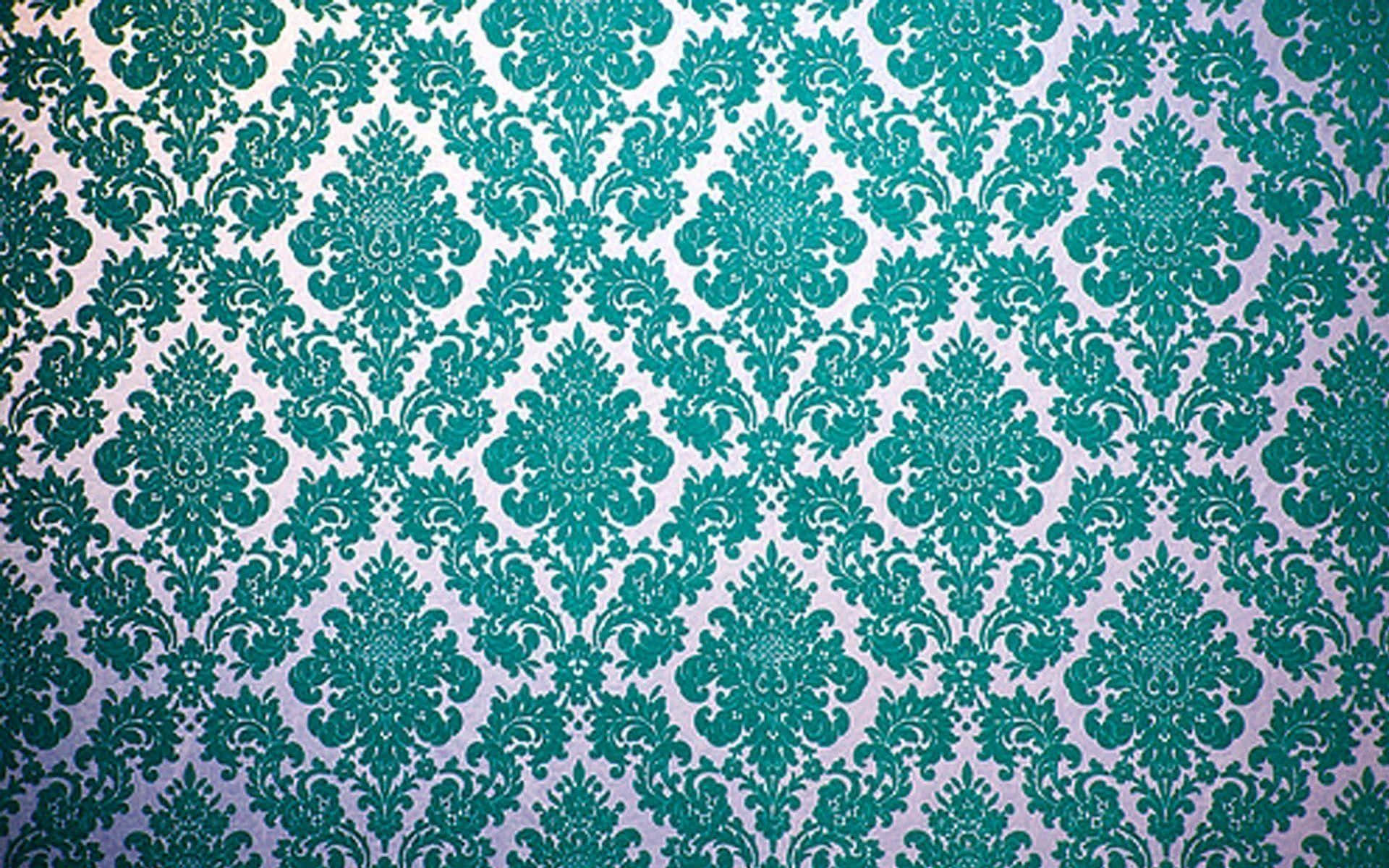 Pattern Desktop 桌布 壁紙 — 一個華麗的藍綠色錦緞壁紙圖案，帶有精緻的花卉和卷草紋，襯托在微漸變的白色背景上。