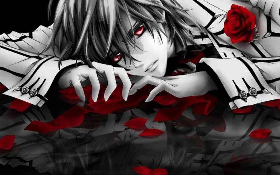 demon boy anime 桌布 壁紙 — 一個蒼白的動漫角色，紅眼睛銀頭髮，躺在散落的紅玫瑰花瓣中，穿著鮮明的黑白西裝。