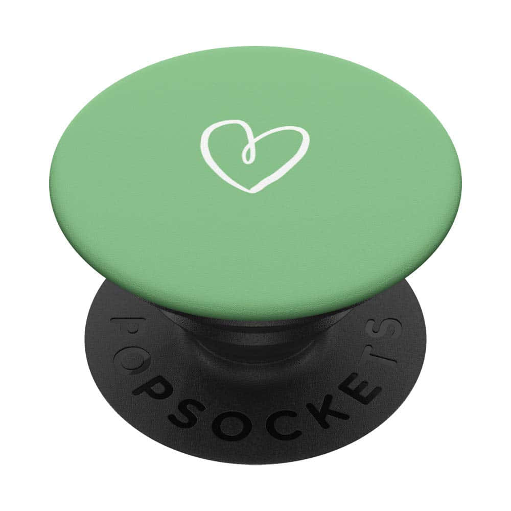 桌布 壁紙 — 一個薄荷綠色的PopSocket，帶有白色心形輪廓，放在黑色底座上，背景為純白色。