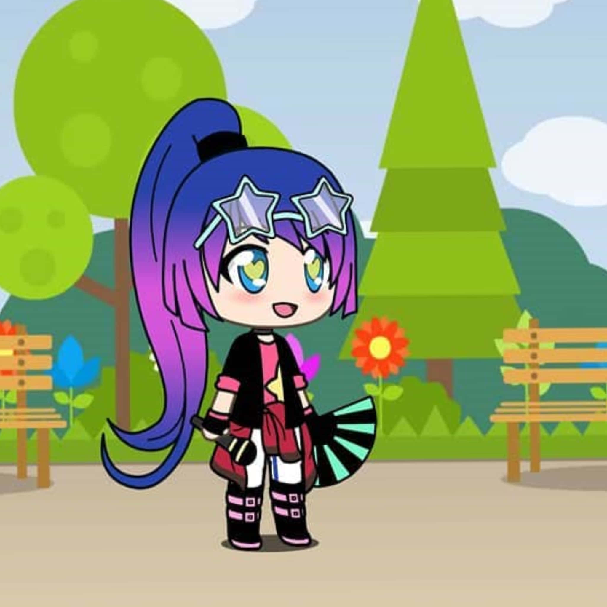 Gacha 桌布 壁紙 — 一個藍紫色頭髮、戴著星星眼鏡的Q版動漫女孩，站在一個色彩繽紛、有長椅、樹木和花朵的公園裡。