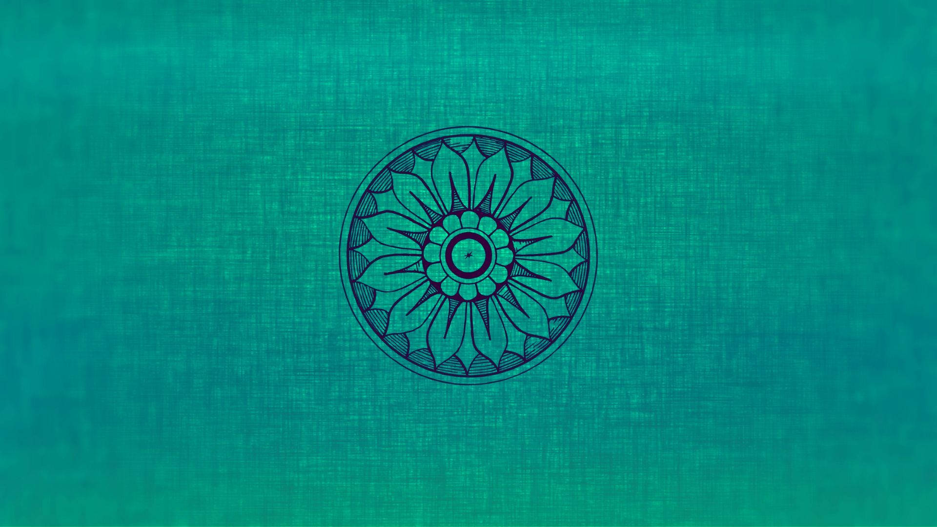 Turquoise 桌布 壁紙 — 一個藍綠色曼陀羅，帶有複雜的花卉圖案，中心位於有紋理的藍綠色布料背景上。
