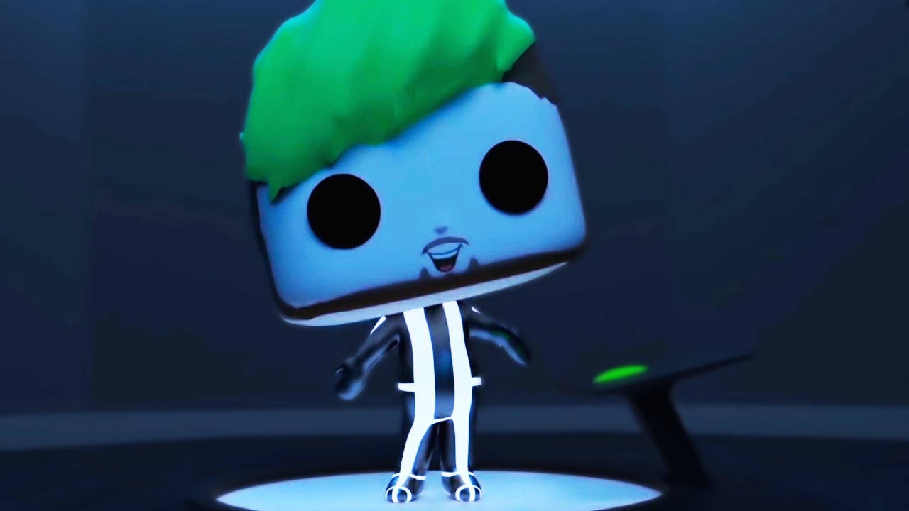 Jacksepticeye 桌布 壁紙 — 一個藍色方塊卡通角色，有綠色頭髮和發光的白色條紋，站在黑暗房間中的發光平台上。