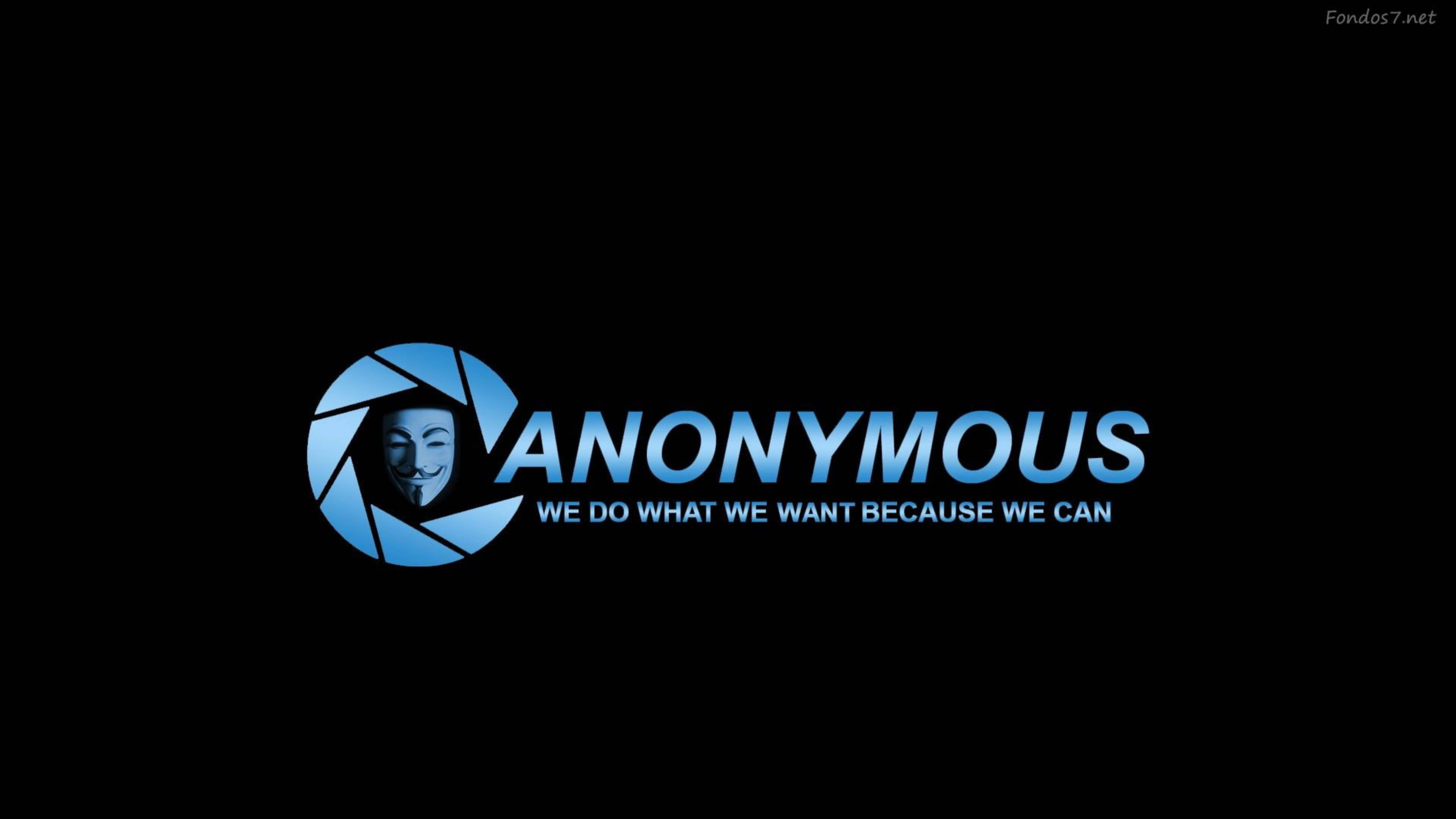 駭客 桌布 壁紙 — 一個藍色的Anonymous標誌，在黑色背景上有一個相機光圈內的蓋伊·福克斯面具。