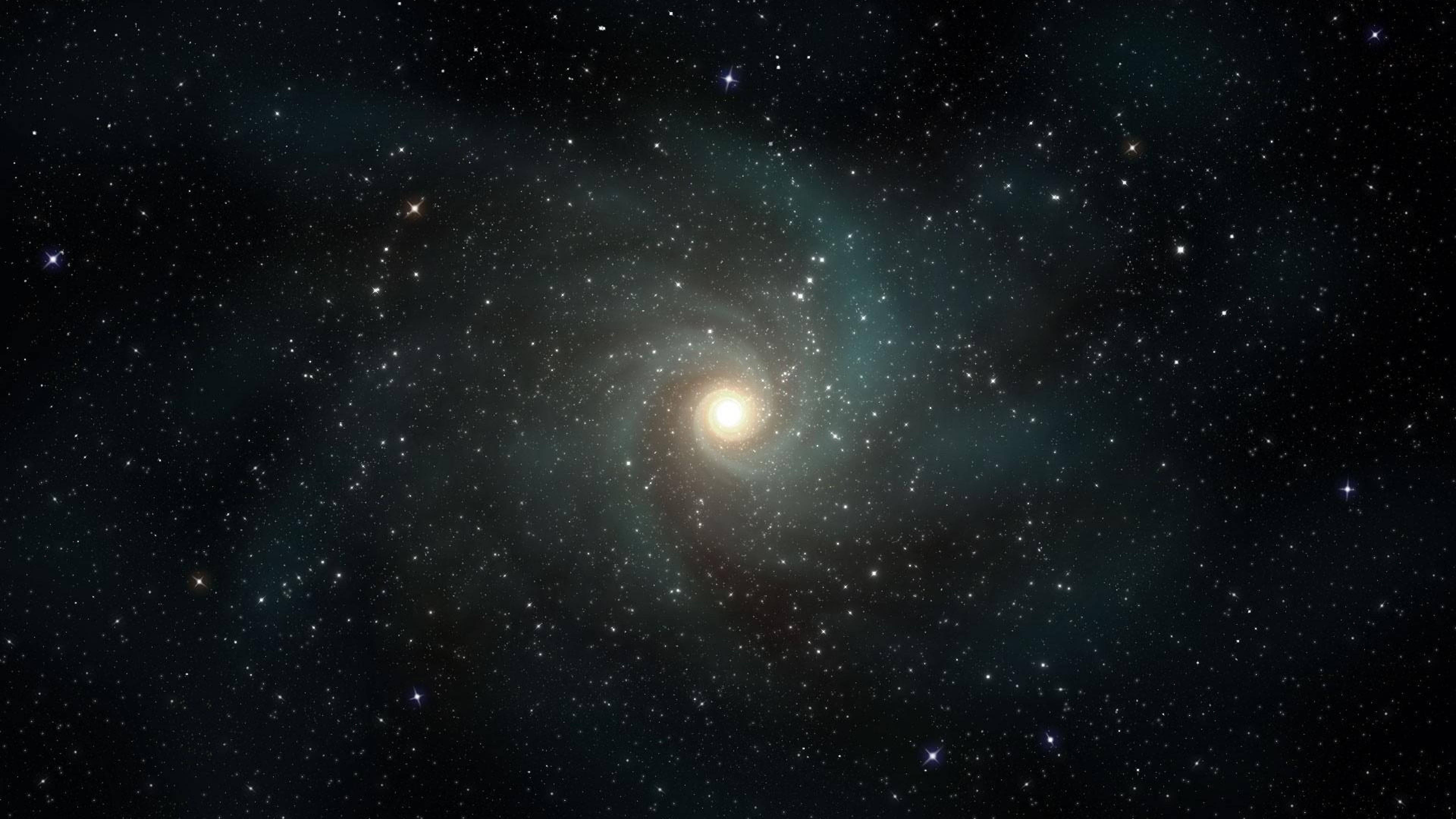 宇宙 桌布 壁紙 — 一個螺旋星系在星空中閃耀著明亮的核心和旋轉的藍綠色及金色塵埃雲。
