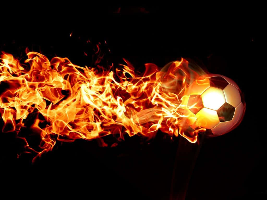 Football On Fire 桌布 壁紙 — 一個被咆哮的橙色火焰吞噬的足球，背景是純黑色。