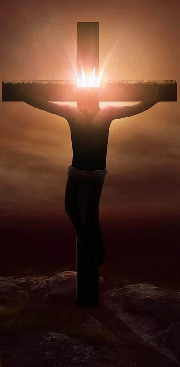 Jesus Crucifixion 桌布 壁紙 — 一個被釘在十字架上的人物剪影，荊棘冠冕發出耀眼的光芒，映襯著昏暗的天空。