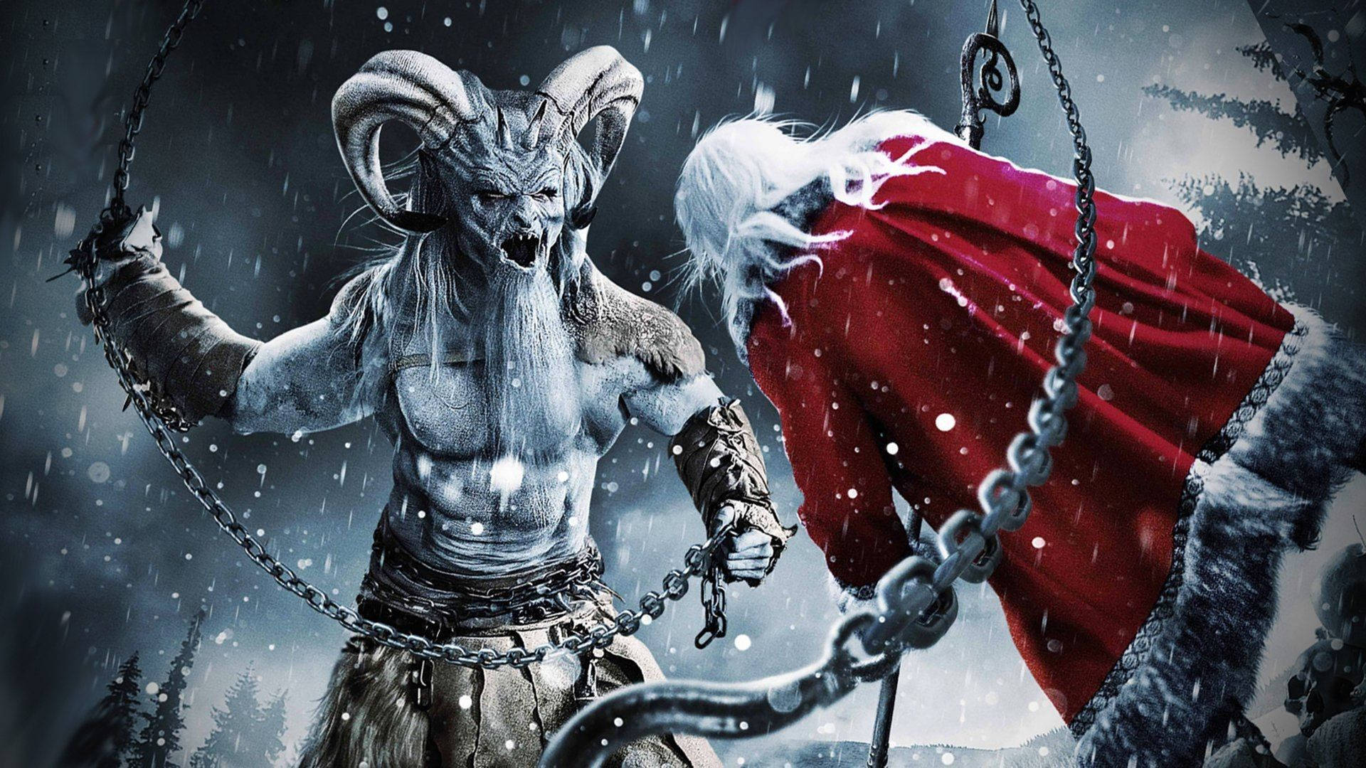 詭異 桌布 壁紙 — 一個被鎖鏈纏繞的惡魔角狀人物在夜晚的雪地森林中與被鎖鏈束縛的聖誕老人對峙。