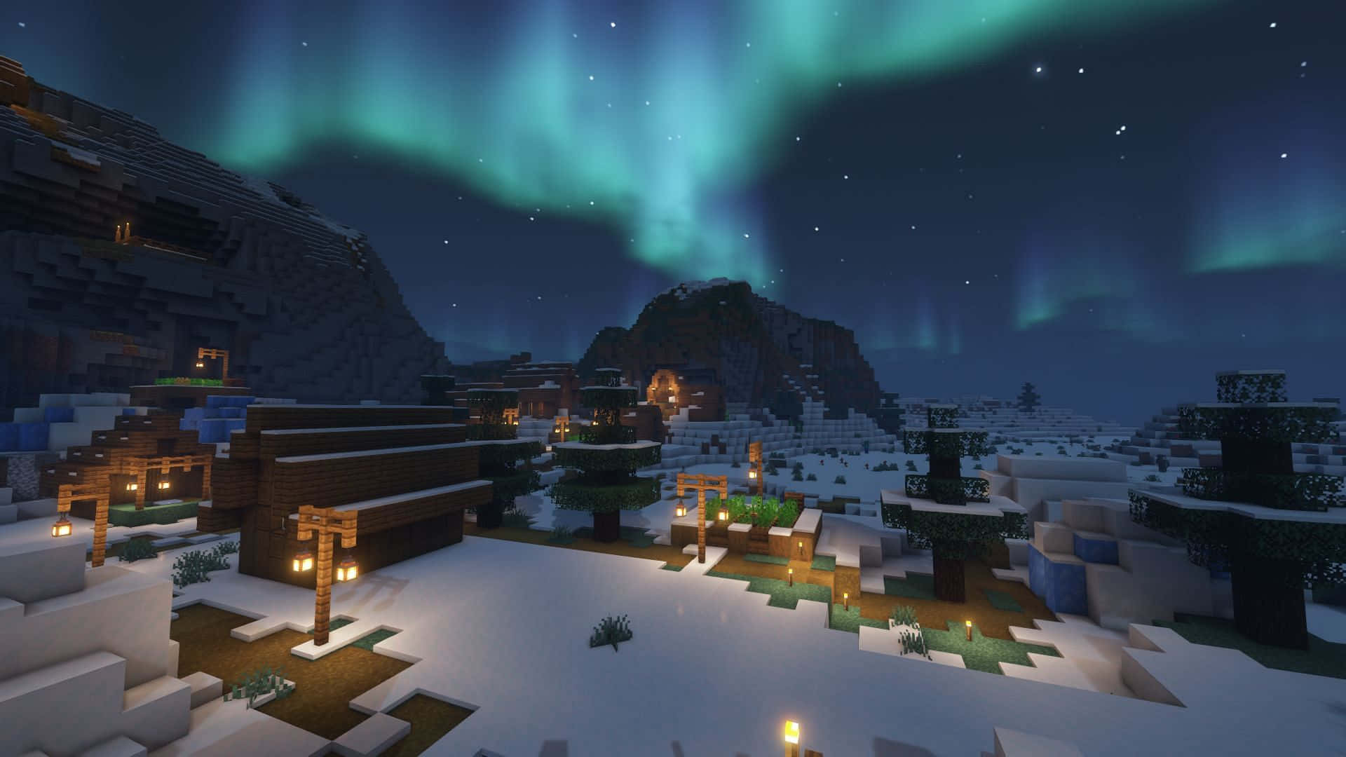泰拉瑞亞 桌布 壁紙 — 一個被雪覆蓋的Minecraft村莊，在充滿活力的綠色北極光下，發光的燈籠照亮了夜晚的方塊景觀。