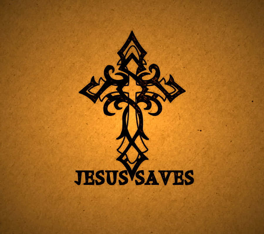 Jesus Saves 桌布 壁紙 — 一個裝飾性的黑色十字架，帶有漩渦狀細節和文字 Jesus Saves，在帶有紋理的暖棕色背景上大膽地矗立著。