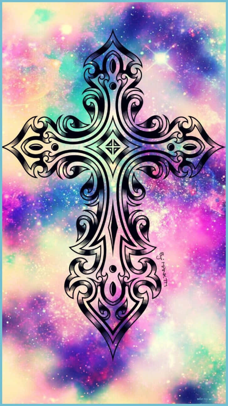 Cute Cross 桌布 壁紙 — 一個裝飾性的黑色部落十字架，帶有複雜的漩渦圖案，漂浮在充滿粉紅色、紫色和藍綠色星星的充滿活力的宇宙星雲前。