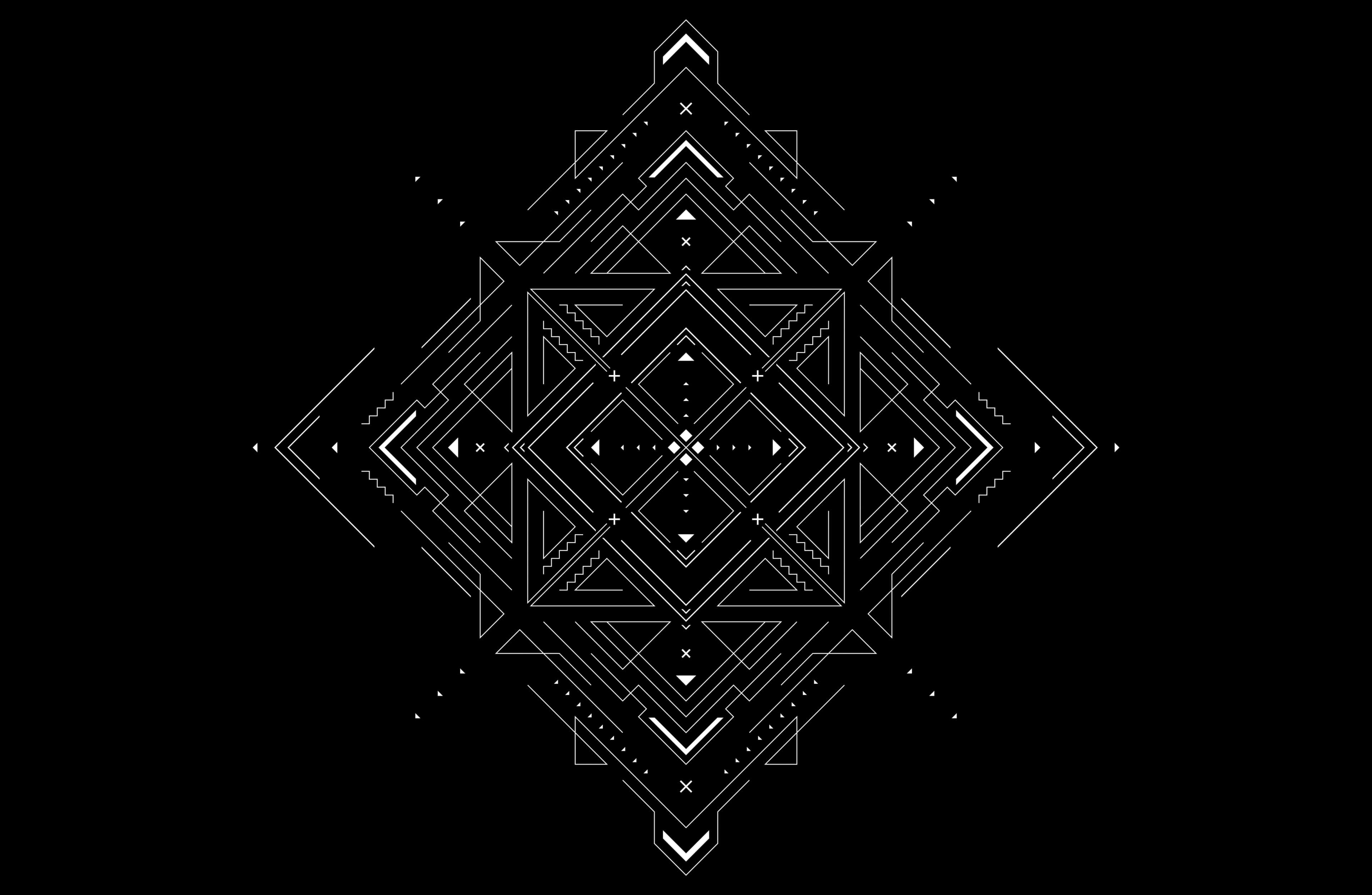 Black And White Geometric 桌布 壁紙 — 一個複雜的白色幾何圖案從黑色背景上的中央菱形向外輻射。