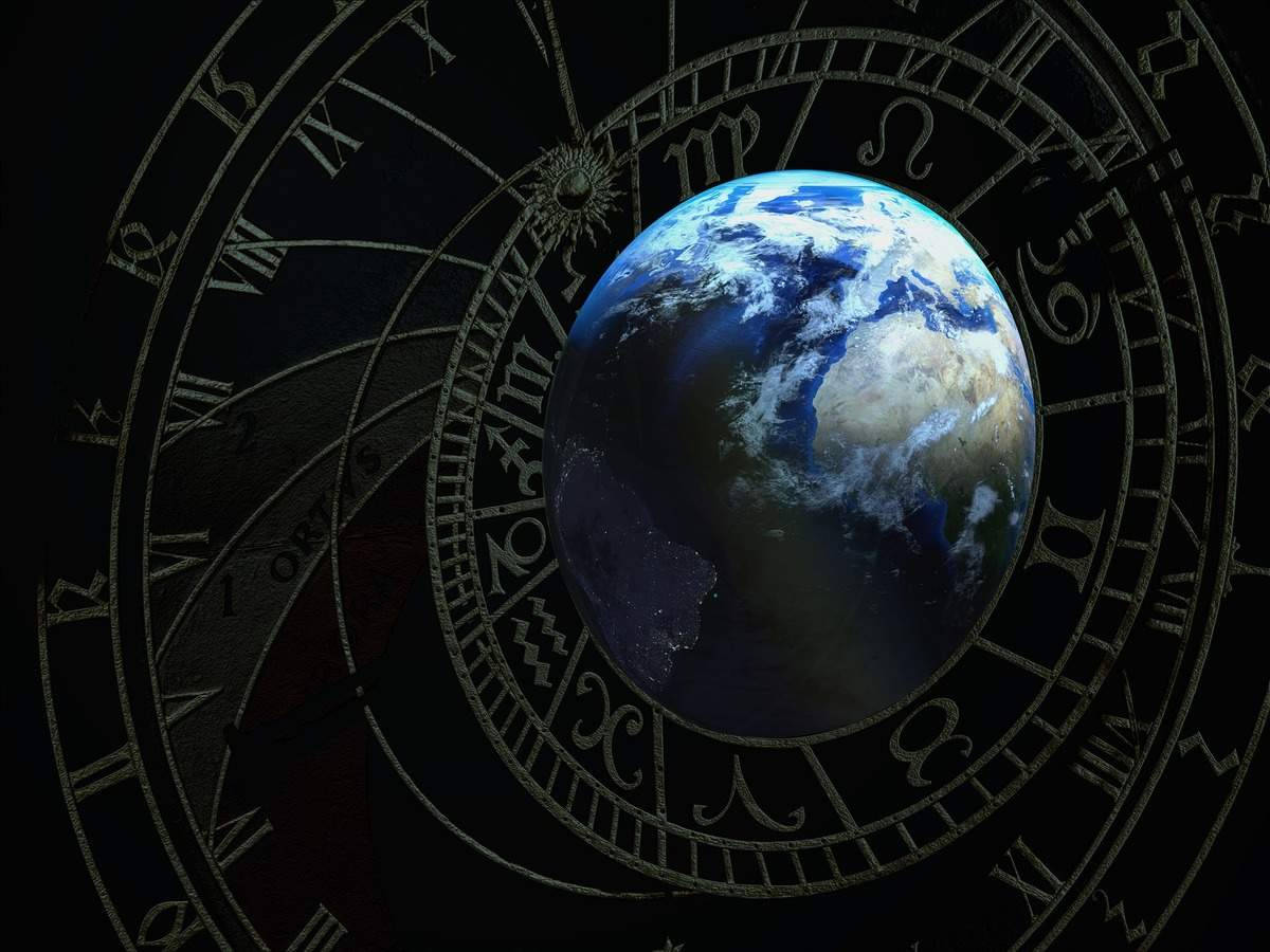 Horoscope 桌布 壁紙 — 一個詳細的3D渲染，地球位於華麗的占星黃道輪中心，背景為深色。