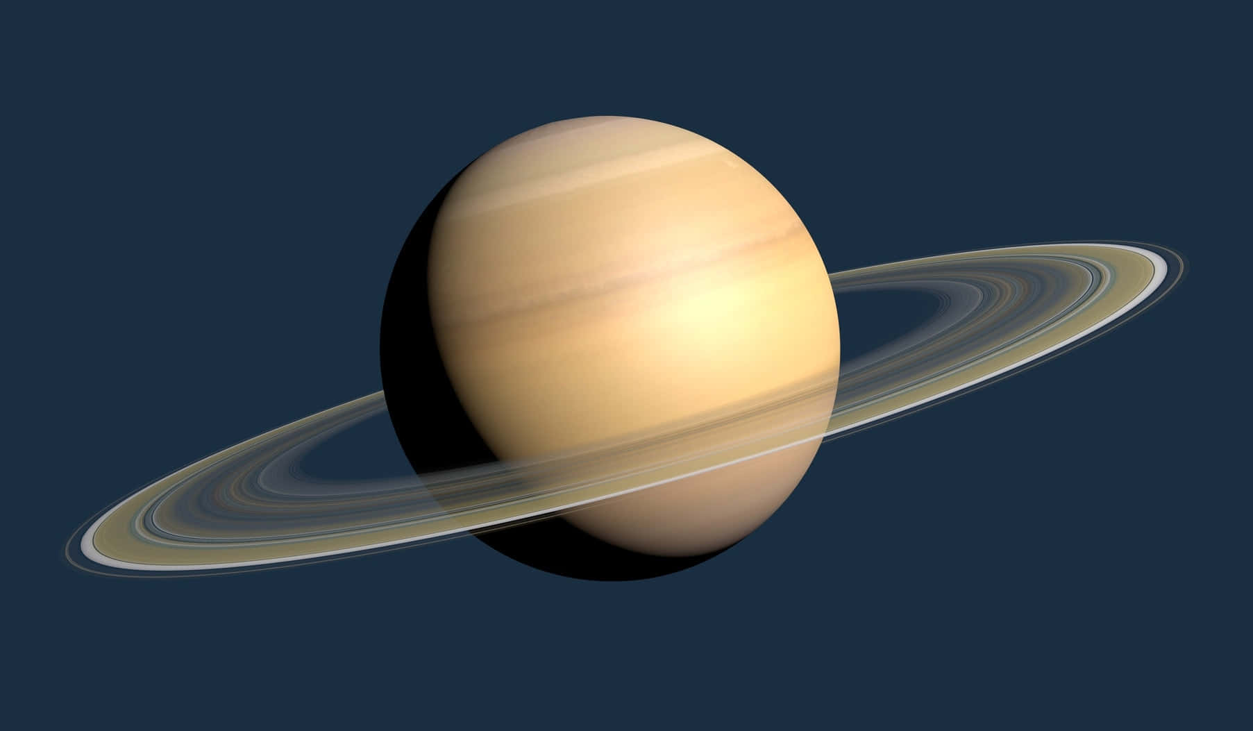 行星動畫 桌布 壁紙 — 一個詳細的3D渲染圖，描繪土星及其標誌性光環在深藍色太空背景下柔和發光。