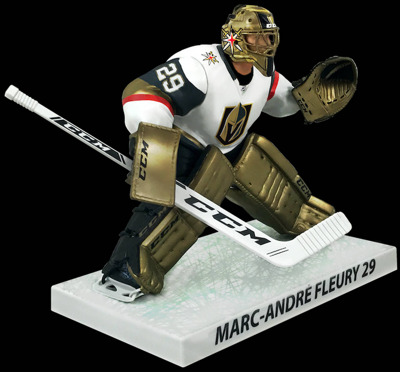 hockey 桌布 壁紙 — 一個詳細的冰球守門員 Marc-André Fleury 公仔，身穿金色和白色的維加斯金騎士裝備，蹲下並手持球棍和手套。