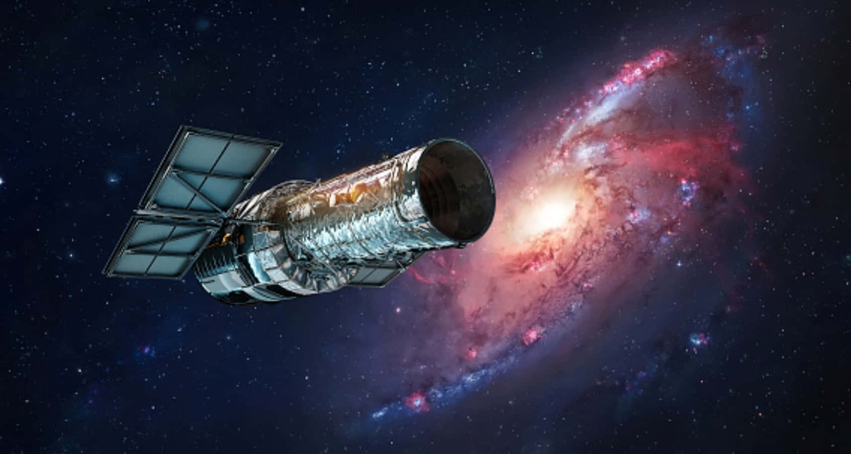 Hubble Space Telescope 桌布 壁紙 — 一個詳細的哈伯太空望遠鏡漂浮在深空中，對著一個散發紅光和藍光的鮮豔螺旋星系。