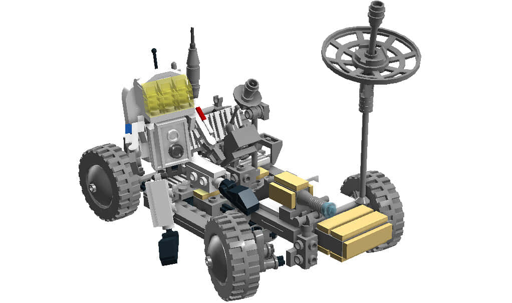 Lunar Rover 桌布 壁紙 — 一個詳細的灰色和黃色LEGO模型，展示了一款未來主義的越野車，配有大輪胎和暴露的機械部件。