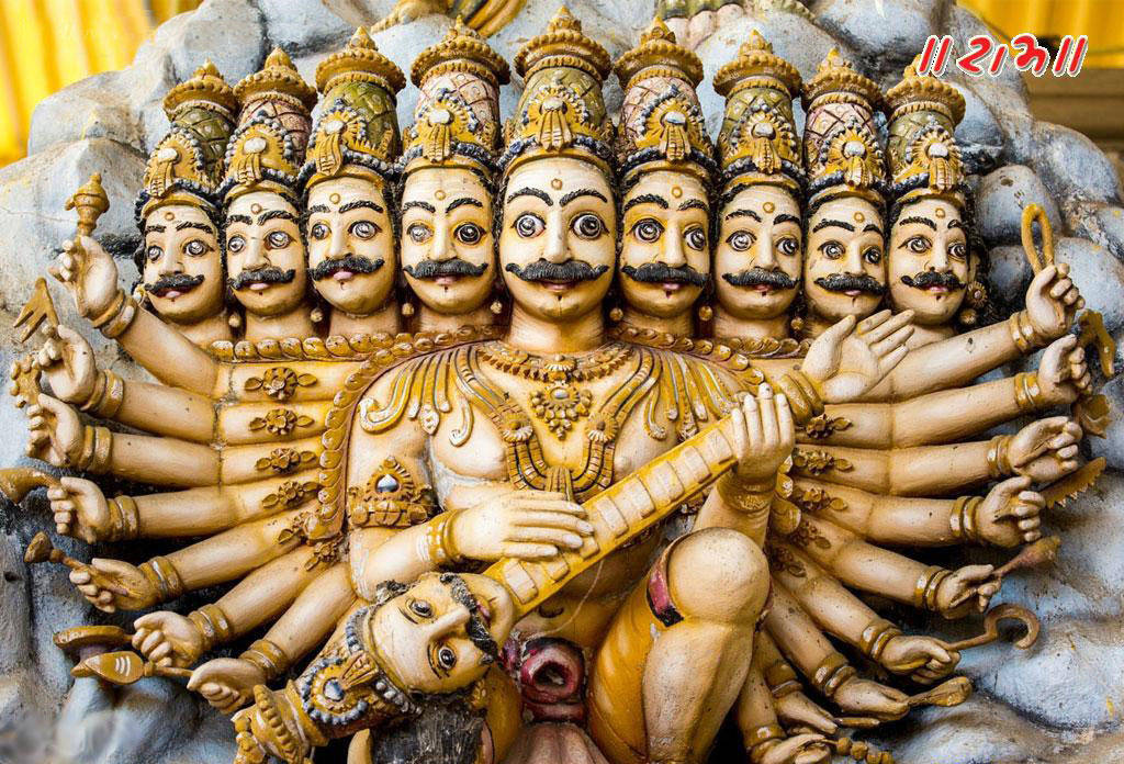 Ravana 桌布 壁紙 — 一個詳細的雕塑，描繪一位多頭多臂的印度教神祇，正在彈奏一件帶有華麗金色裝飾的弦樂器。