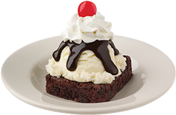 Desserts 桌布 壁紙 — 一個豐富的巧克力布朗尼，上面放有香草冰淇淋、巧克力糖漿和一顆鮮紅色的櫻桃，放在白色盤子上。