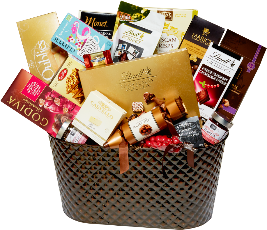 gifts 桌布 壁紙 — 一個豪華禮品籃，裝滿了來自Lindt、Godiva和Monet等品牌的優質巧克力和美食佳餚。