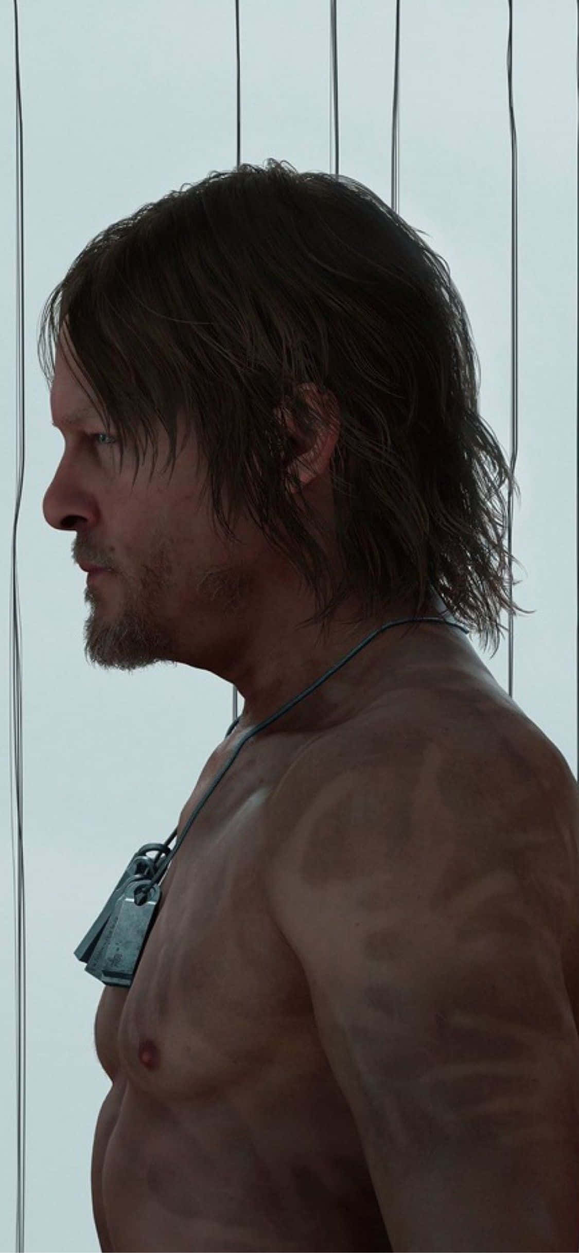 iPhone X Death Stranding 桌布 壁紙 — 一個赤裸上身、頭髮濕透、戴著狗牌項鍊的男人，在柔和光線下側身站在垂直欄杆前。