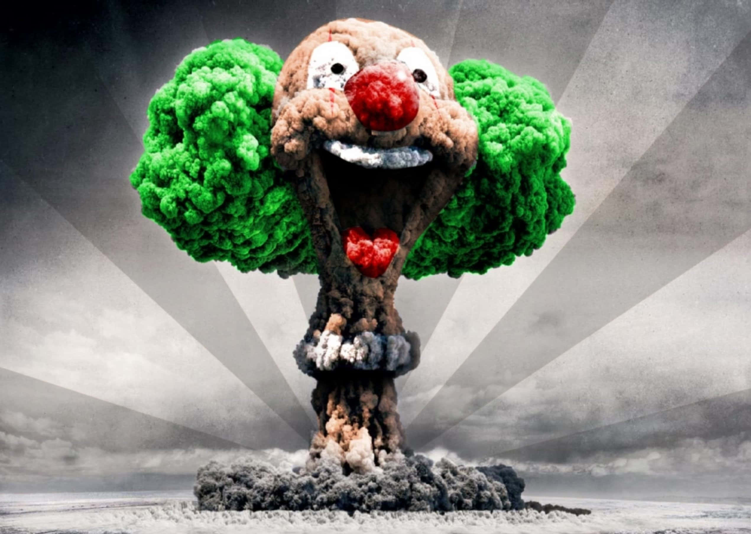 Nuclear Bomb 桌布 壁紙 — 一個超現實的蘑菇雲，形狀像一個帶有綠色煙霧頭髮、紅鼻子和心形領結的可怕小丑，背景是灰色天空。