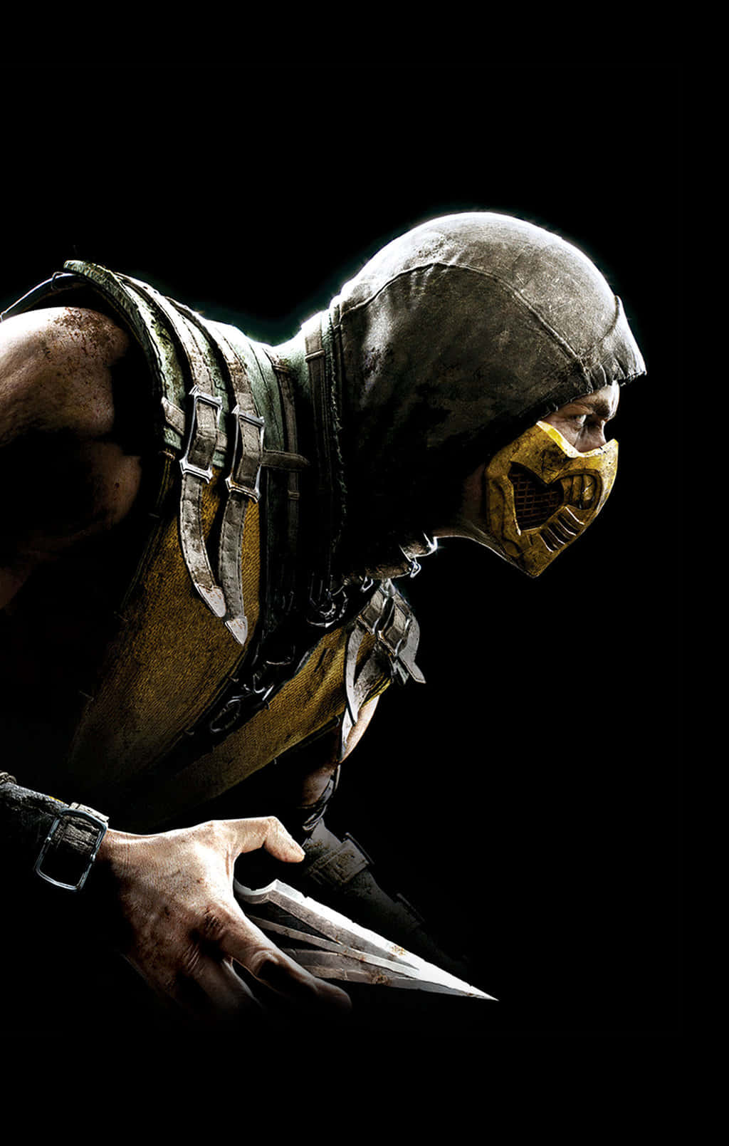 Mortal Kombat iPhone 桌布 壁紙 — 一個身穿暗色盔甲、戴著面具的威脅性戰士，在黑色背景前緊握匕首。
