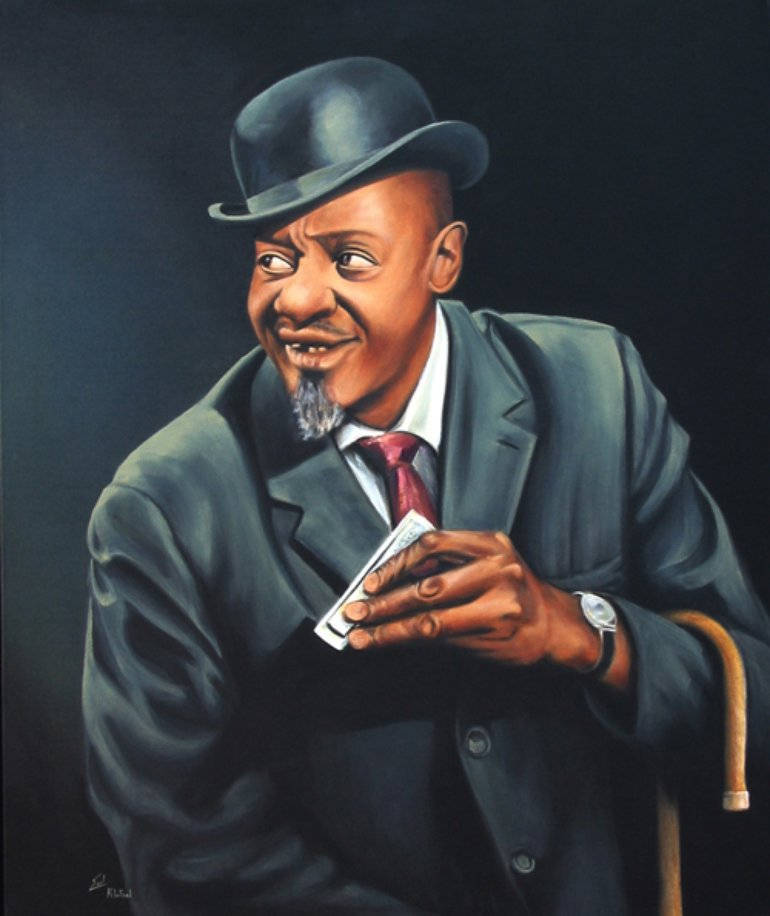 Smile 桌布 壁紙 — 一個身穿深色西裝、戴著圓頂禮帽的男人，在陰影背景中拿著撲克牌，露出頑皮的笑容。