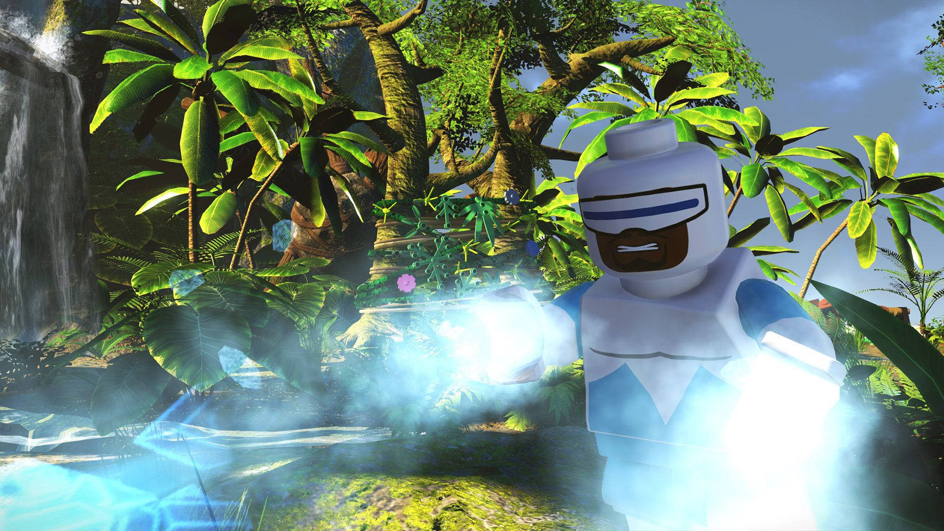 Frozone 桌布 壁紙 — 一個身穿白色和藍色盔甲的LEGO迷你人偶站在茂密的叢林中，瀑布散發著藍色能量。