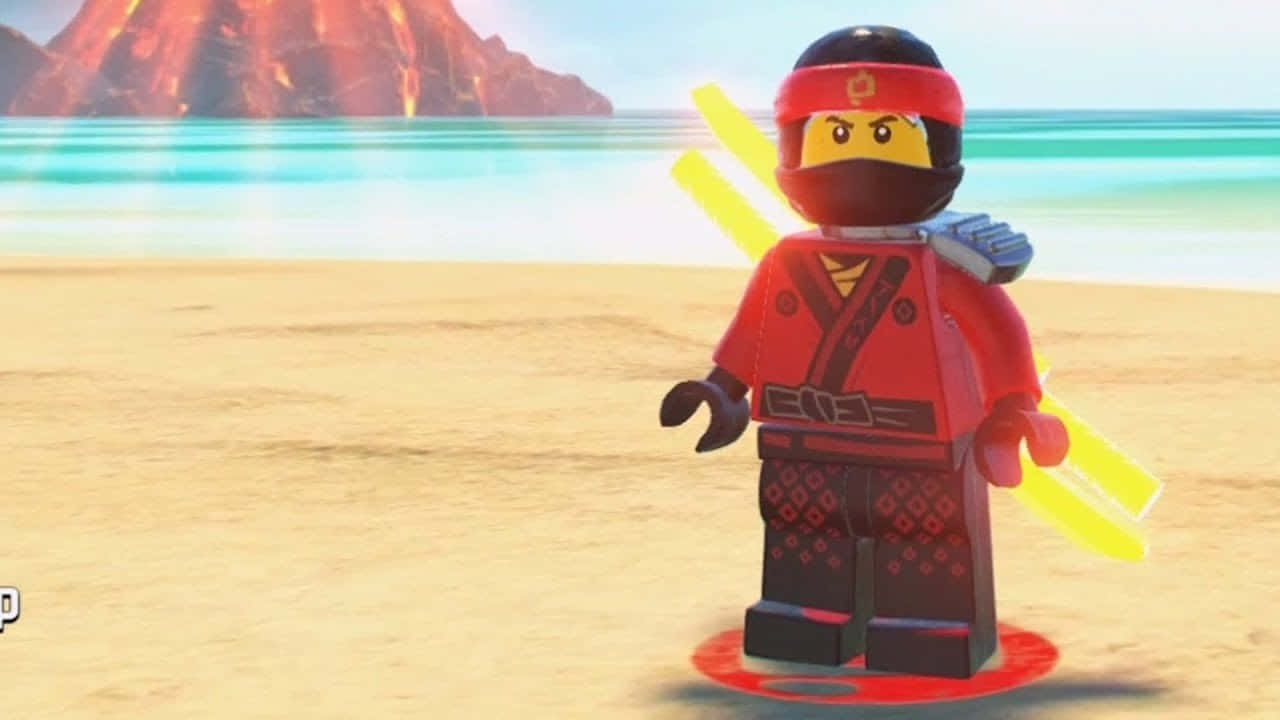 Animated 桌布 壁紙 — 一個身穿紅色衣服的LEGO忍者站在沙灘上，手持發光的黃色雙節棍，背景是一座火山島。