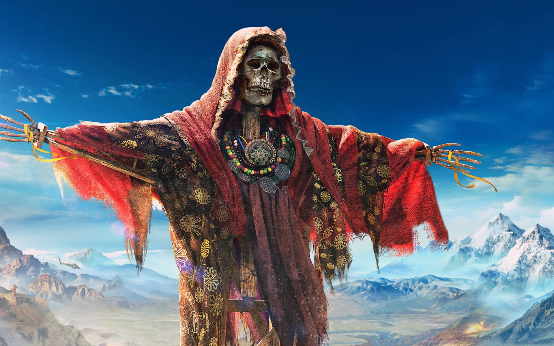 tom clancy's ghost recon wildlands 桌布 壁紙 — 一個身穿紅金長袍的骷髏身影，在晴朗藍天下以雪山為背景張開雙臂站立。