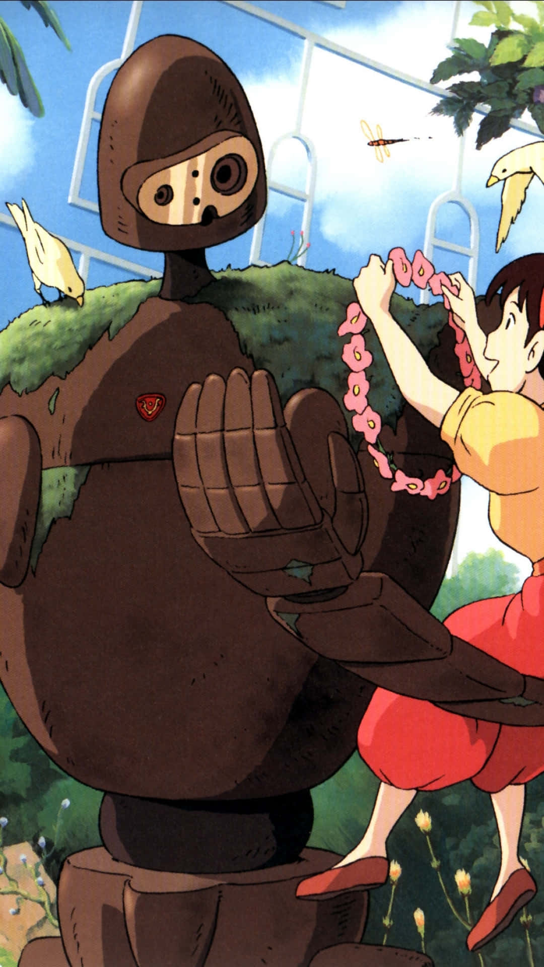 Laputa Castle In The Sky 桌布 壁紙 — 一個身穿紅黃衣服的小女孩，在藍天白雲、鳥兒飛翔的背景下，輕輕地將一條粉紅色花鏈掛在一個長滿苔蘚的棕色機器人脖子上。